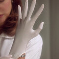 katie Holmes in medical gloves.mp4