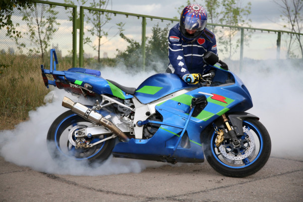 depositphotos 7433375-stock-photo-motorcyclist-and-the-moto