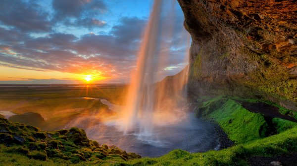 Скала Исландия Sunset лучи