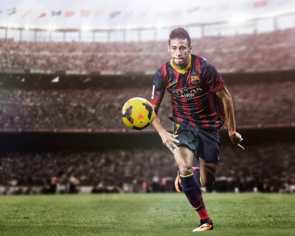 Football player Neymar on the soccer field with the ball