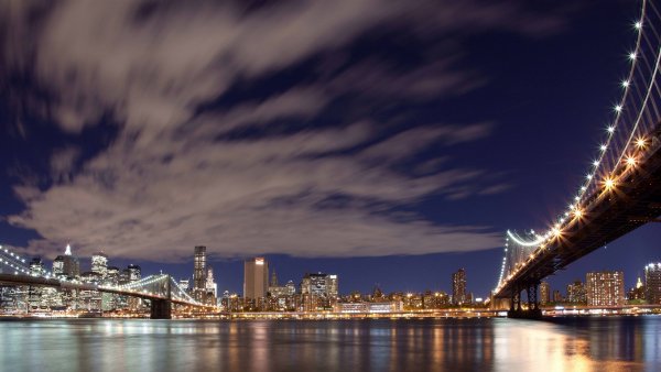 Night-in-New-York-the-lights-the-bridge-the-river-high-rise-b