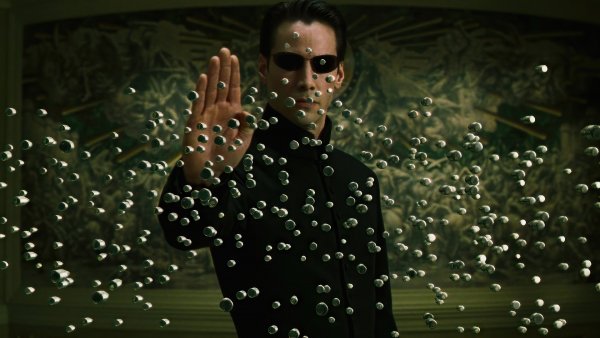 The-matrix-neo-stopping-bullets-kenau-reeves-4k-wallpaper
